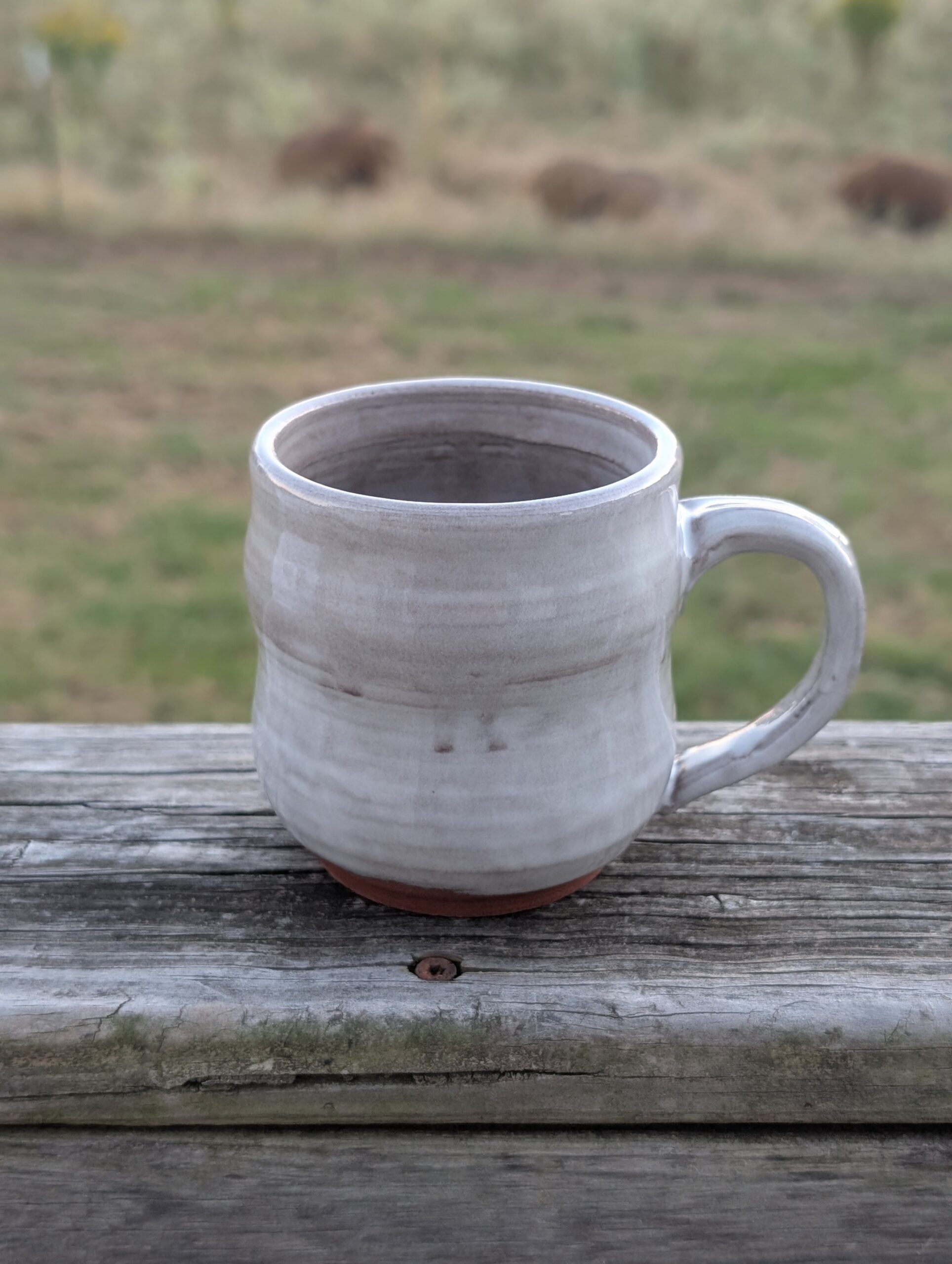 Handcrafted White Ceramic Mug 9